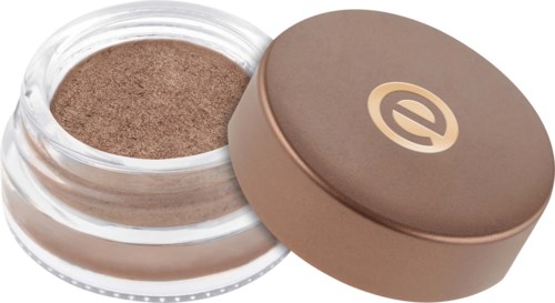En liten beholder med brunt makeup- eller hudpleieprodukt med tilsvarende lokk.