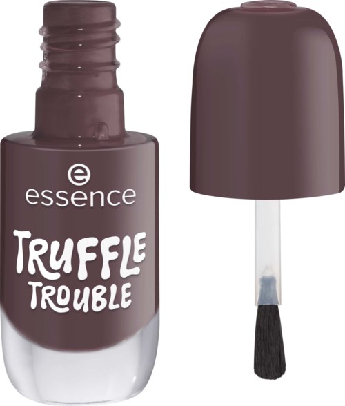 A small bottle of dark nail polish with a cap and a brush in front of it.