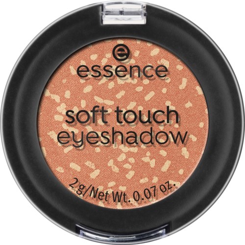 Eyeshadow compact with a peach-colored, speckled surface and black text. It says 'essence soft touch eyeshadow' and '2.8g'.