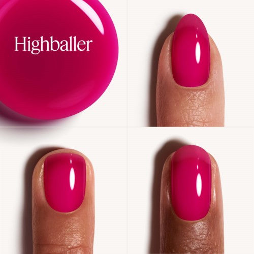 Bright pink nail polish applied on fingernails, with a round bottle showing the brand 'Highballer'.
