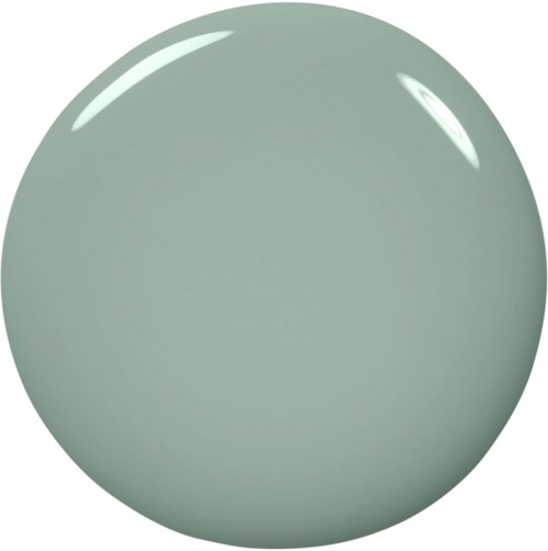 En jämn, rund, ljusgrön boll med glänsande reflektioner.