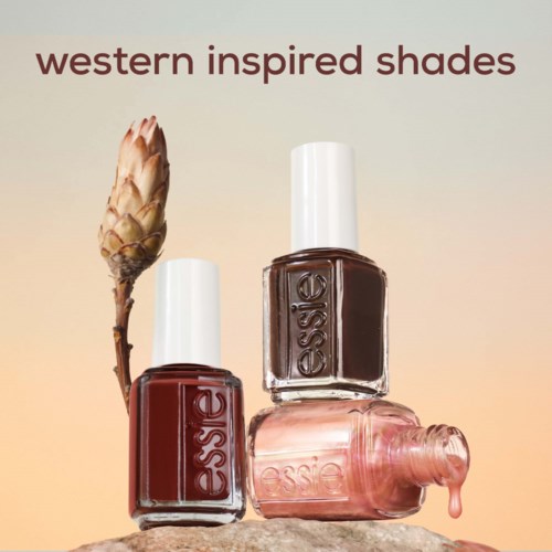 Three nail polish bottles labeled 'Essie' with an artichoke next to them on a pastel background.