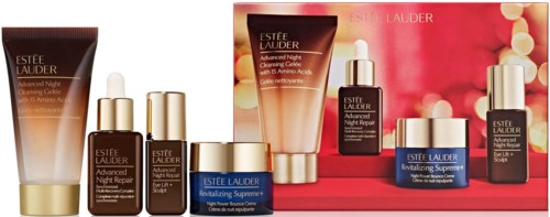 An assortment of Estée Lauder skincare products including creams and serums arranged on a pink background.