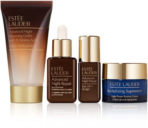Four Estée Lauder skincare products in gold and brown packaging, including a night cleanser, repair serum, eye cream, and night cream.