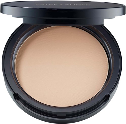 A compact of pressed face powder with a black lid and beige powder inside.