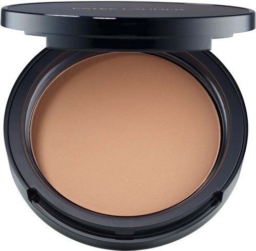A compact powder case with beige pressed powder inside, open lid showing the product.