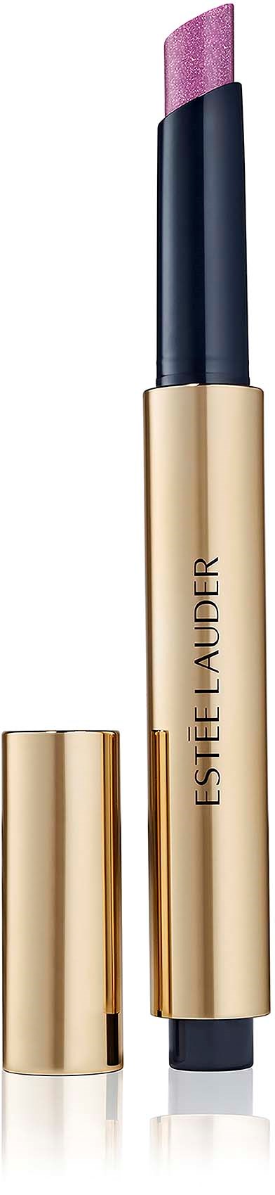A pink-lilac eyeshadow stick with beige and black packaging, labeled Estée Lauder, standing vertically with the lid removed.