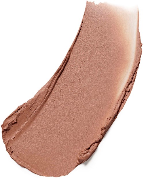 A swipe of beige foundation or concealer with a textured and smooth surface.