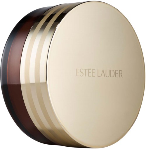 A round, beige container with gold and black stripes, labeled 'Estée Lauder'.