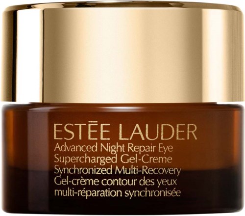 A brown jar with a gold lid, labeled 'Estée Lauder' for eye repair cream. Contains text in English and French.