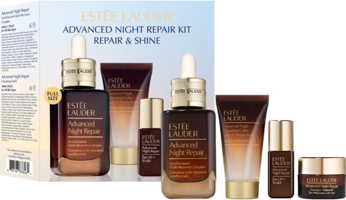 Een set van Estee Lauder Advanced Night Repair huidverzorgingsproducten met flessen, tubes en een klein potje.
