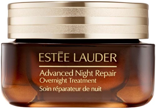 Een bronzen pot met gouden deksel, gemerkt 'Estée Lauder Advanced Night Repair'. Het is voor nachtelijke huidverzorging.