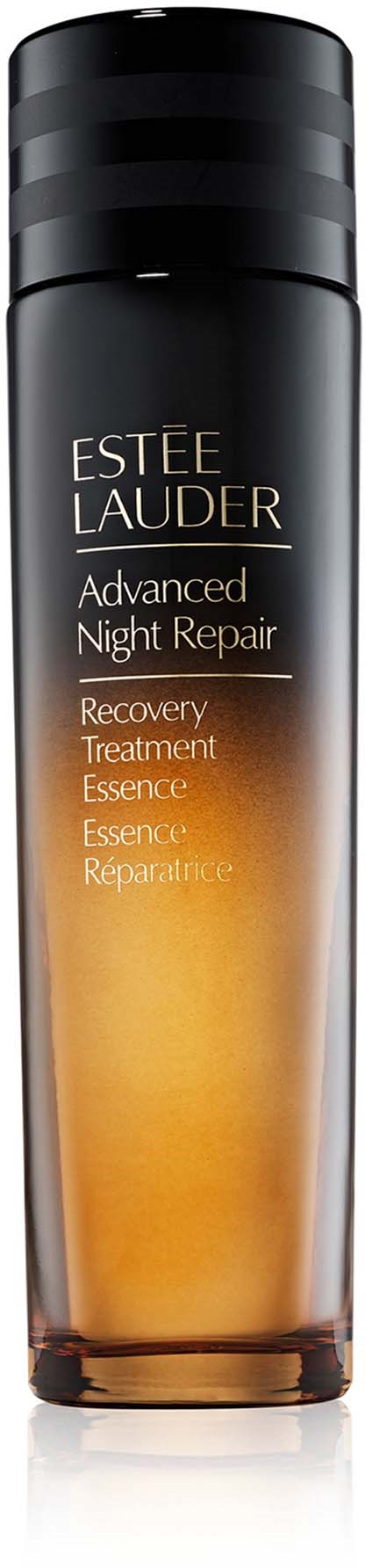 En lång, cylindrisk flaska med Estée Lauder Advanced Night Repair serum, svart lock och orangeaktigt innehåll.