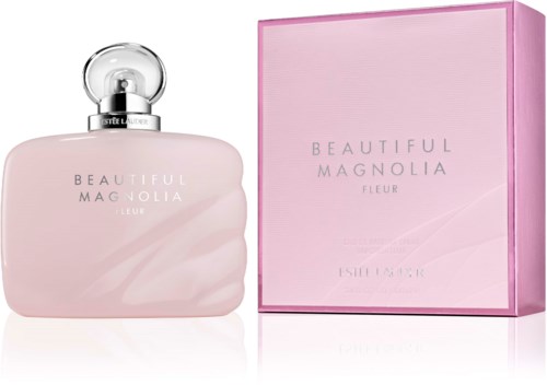 Een roze parfumfles met zilveren dop en bijpassend roze doosje, gemarkeerd "Beautiful Magnolia Fleu."
