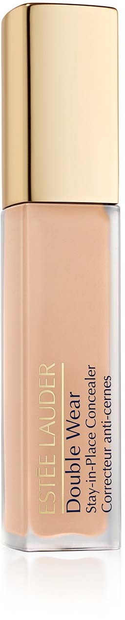 Een flesje van Estée Lauder Double Wear Corrector met een gouden dop en een beige label. Het product is bedoeld om oneffenheden te verbergen.