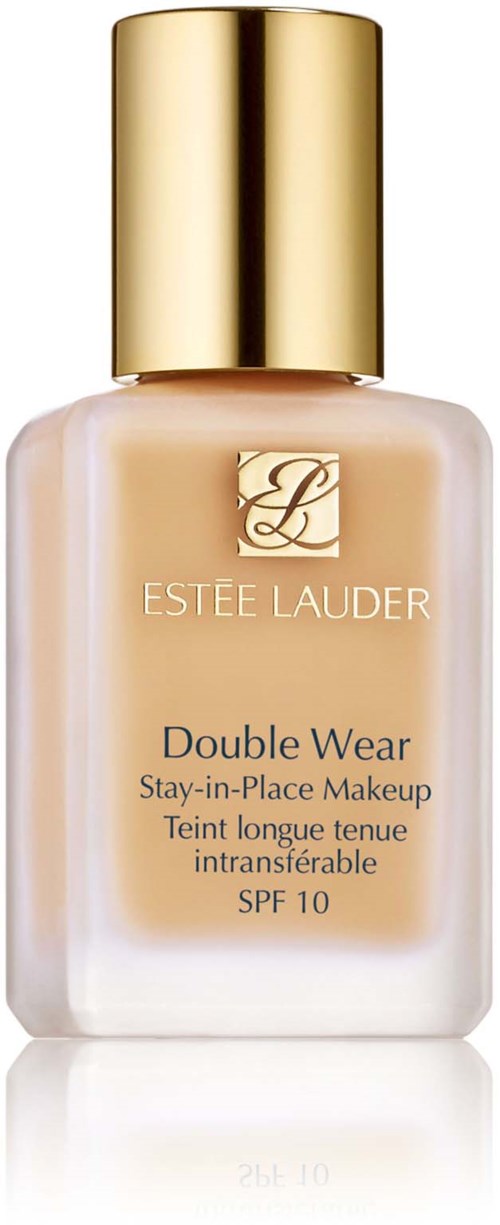 En foundationsflaska med guldkork, beige vätska inuti och varumärket Estée Lauder på framsidan.
