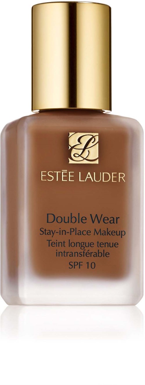 En flaska av Estée Lauders Double Wear foundation med guldlock och brunt flytande inuti.