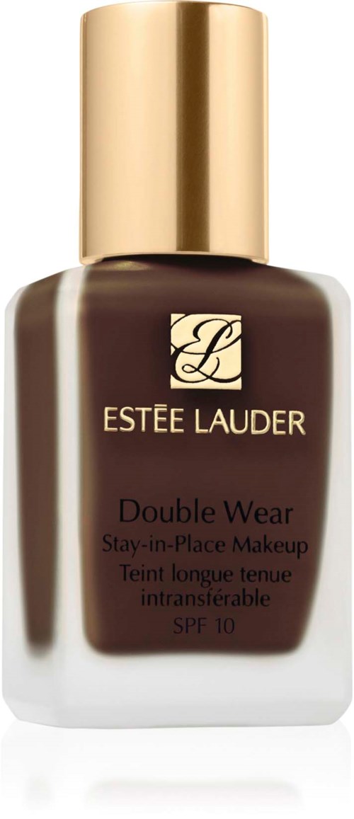 En flaska av Estée Lauder Double Wear foundation med guldlock och mörkbrun vätska inuti.