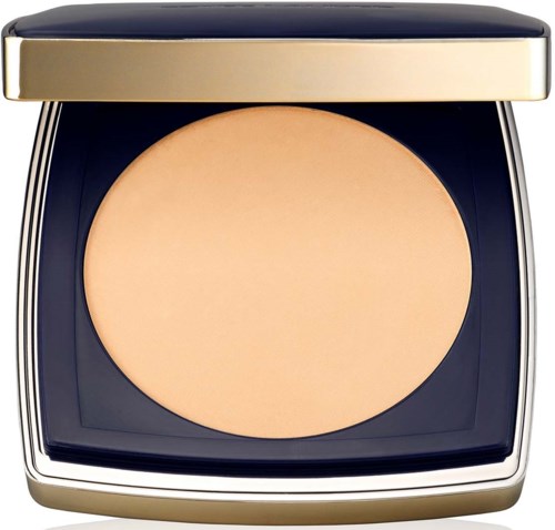Een compact met beige poeder in een zwart en goud doosje.