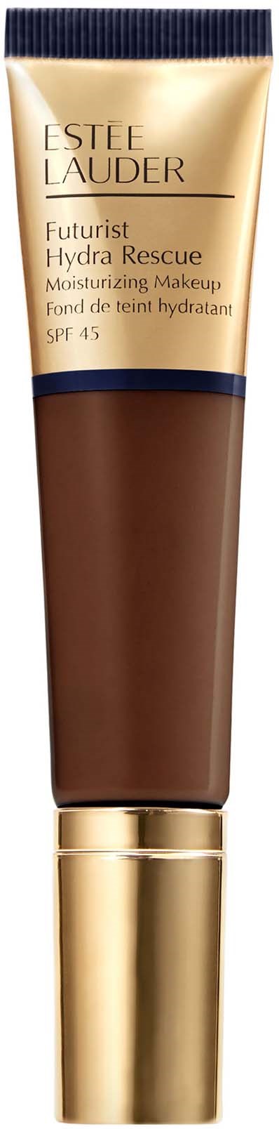 Een tube make-up van Estée Lauder met goudkleurige en donkerblauwe verpakking, met label 'Futurist Hydra Rescue'.