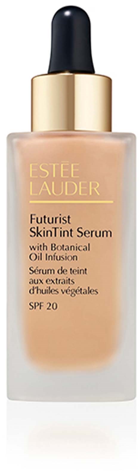 Eine Flasche Estee Lauder Futurist SkinTint Serum mit schwarzem und goldenem Deckel.
