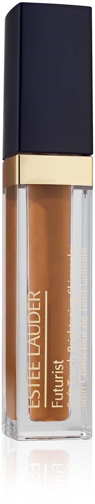 Een vloeibare concealer met een zwarte dop, goudkleurige band en doorzichtige body die huidekleurige product toont.