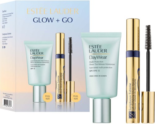 Estée Lauder Glow + Go-Set enthält Feuchtigkeitscreme und Mascara in stilvoller Gold- und Blaum Verpackung.
