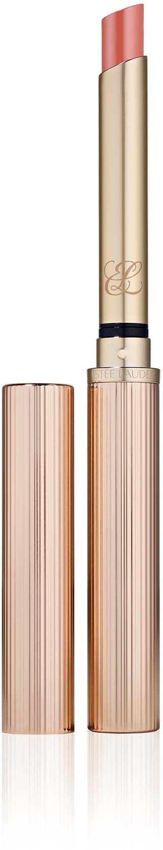 Een beige lippenstift met een roze punt in een glanzende beige tube.
