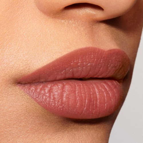 Close-up of lips with pinkish-brown lipstick on smooth skin.