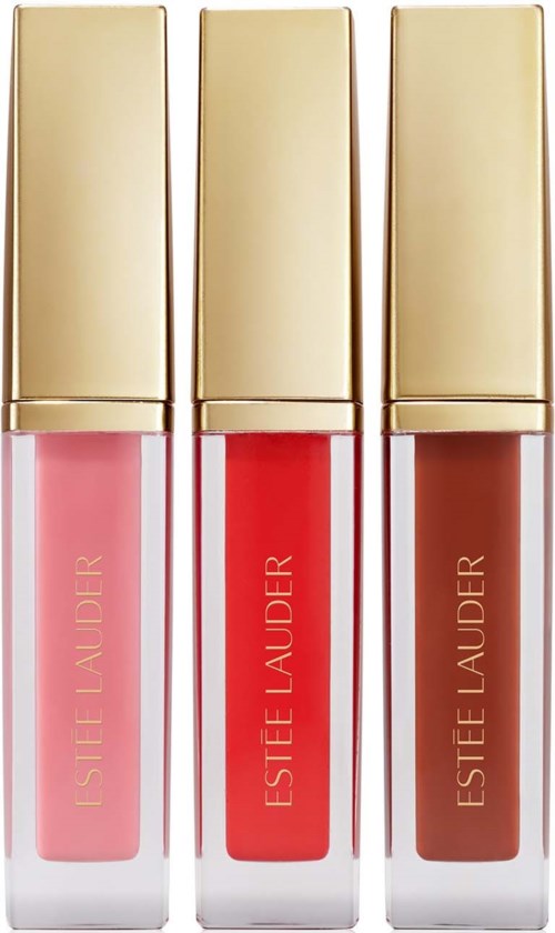 Three lip glosses in pink, red, and brown shades with gold caps from Estée Lauder.