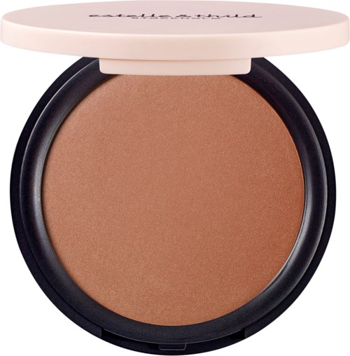 En rund sminkprodukt med beige puder inuti och ett ljust rosa lock på toppen.