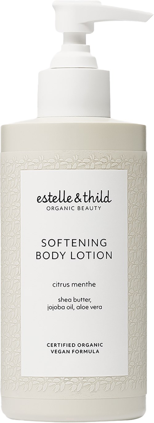 Een witte fles met pomp, gelabeld 'estelle & thild' organische bodylotion, met ingrediënten zoals sheabutter en aloe vera.