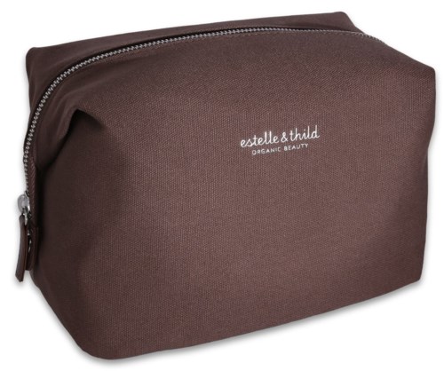 Een bruine stoffen tas met ritssluiting, gemarkeerd 'estelle & thild ORGANIC BEAUTY', compact en eenvoudig ontworpen.