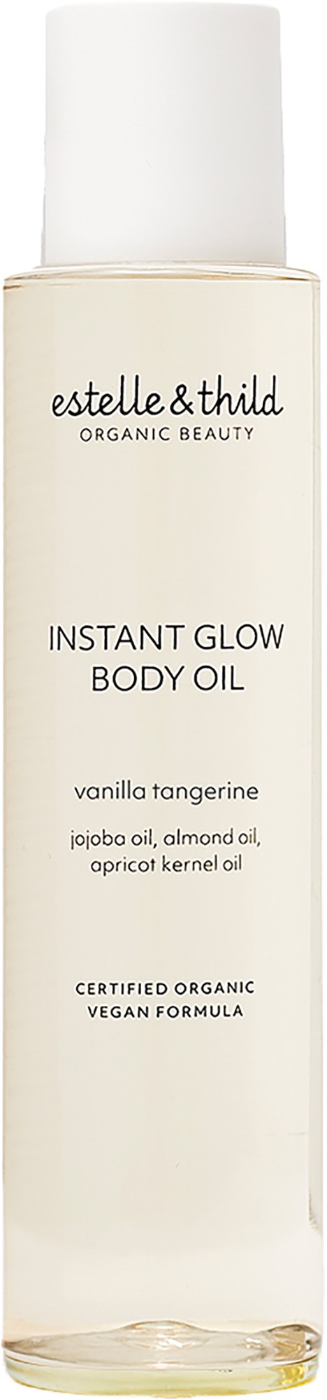 Een lange, witte fles met lichaamsolie met zwarte tekst, label zegt "Estelle & Thild" en "Instant Glow Body Oil."