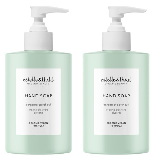 Zwei Flaschen Handseife mit weißen Pumpen und hellgrünen Etiketten, enthalten eine biologische, vegane Formel mit Bergamotte, Aloe Vera und Glycerin.