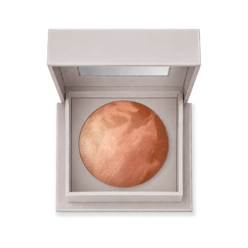 A round bronzer with a shiny, shimmery surface in a white box with a mirror.