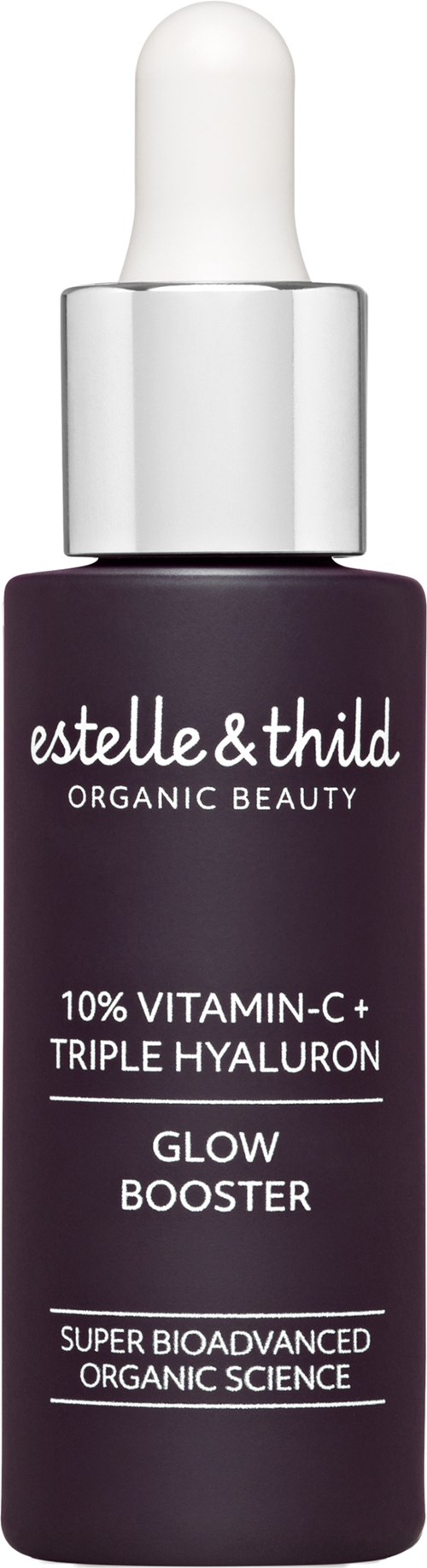 Donkere paarse fles met een witte pipet, label leest Estelle & Thild, oranje gezichtsserum en glow booster.