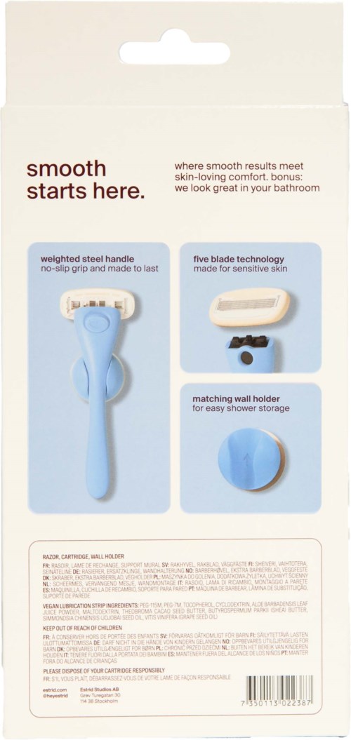 Product packaging showing a bath brush, blade, wall holder, and description of features for smooth skin.