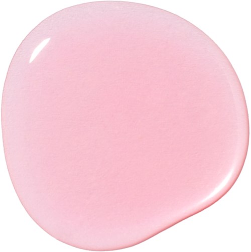 A smooth, pink, round gel or swatch with shiny surface.
