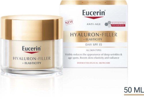 Een potje Eucerin Hyaluron-Filler crème met gouden deksel naast de doos, beide tonen dat het helpt met huidelasticiteit.