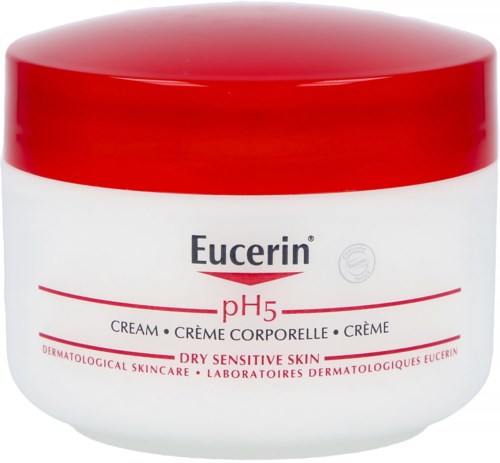 Eucerin Creme für trockene, empfindliche Haut, pH 5, in einem weißen Behälter mit rotem Deckel.