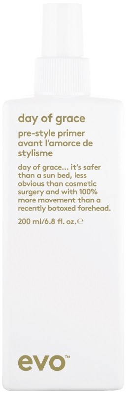 A white bottle labeled 'day of grace' pre-style primer by evo, 200ml, with gold text, no additional design.