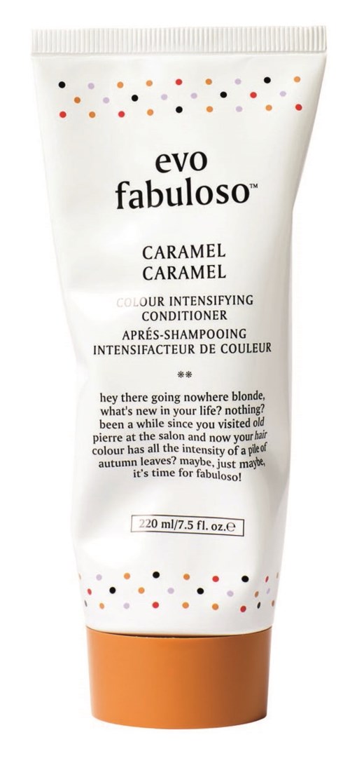 A white tube with orange cap labeled 'Evo Fabuloso Caramel' for hair coloring conditioner, with colorful dots at top and bottom.