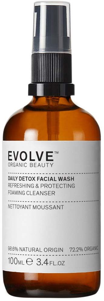 Braune Sprühflasche mit schwarzem Deckel und weißem Etikett mit 'EVOLVE' Markennamen und Produktinformationen.
