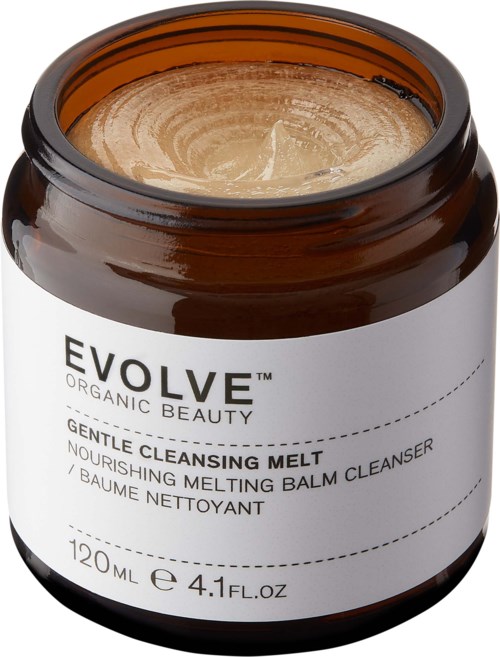 Ein brauner Behälter mit dem Label 'EVOLVE Organic Beauty' und einem sanften Reinigungsbalsam darin.