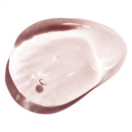 Ein glatter, ovaler, rosa-weißer Stein mit einem kleinen, runden, dunklen Fleck innen.
