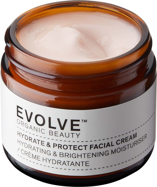 Braune Dose mit weißer Creme, labeled 'EVOLVE Organic Beauty Hydrate & Protect Facial Cream' für Feuchtigkeit und Aufhellung.