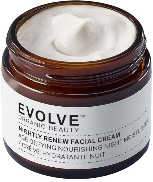 Ein brauner Behälter mit Nachcreme und weißem Etikett, zeigt die Marke 'EVOLVE' und Produktdetails.