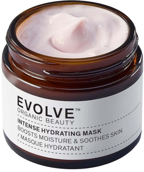 Ein brauner Behälter mit weißen Creme, beschriftet 'EVOLVE Organic Beauty Intensive Hydrating Mask' für Feuchtigkeit und Beruhigung.