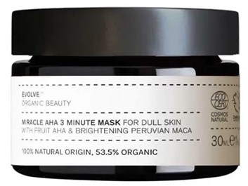 Ein Glas mit Creme, Beschriftung "Evolve Organic Beauty" für trockene Haut, mit Frucht und peruanischer Maca, 30 ml.
